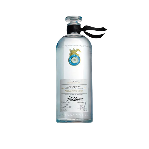 Casa Dragones tequila bottle with a clear glass design and a black ribbon on the neck