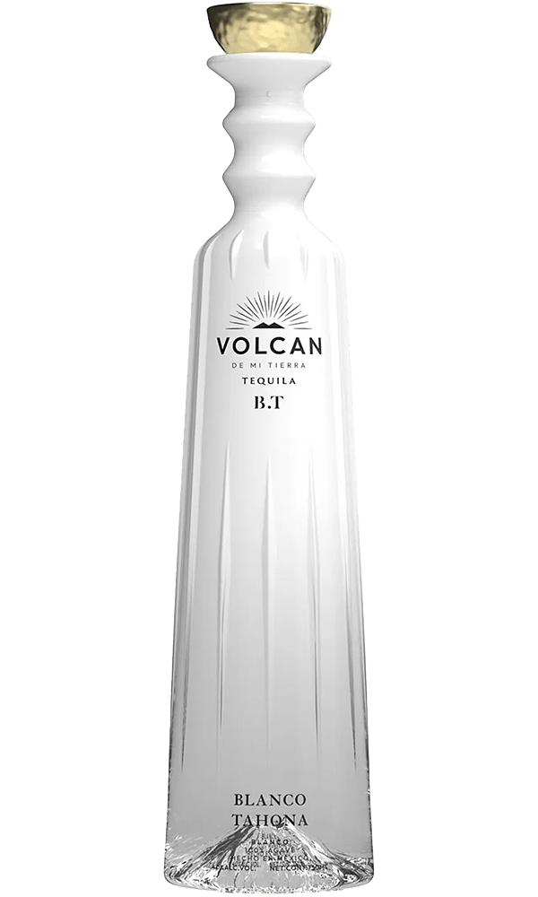 Volcan Tequila Blanco bottle with an elegant design and gold cap